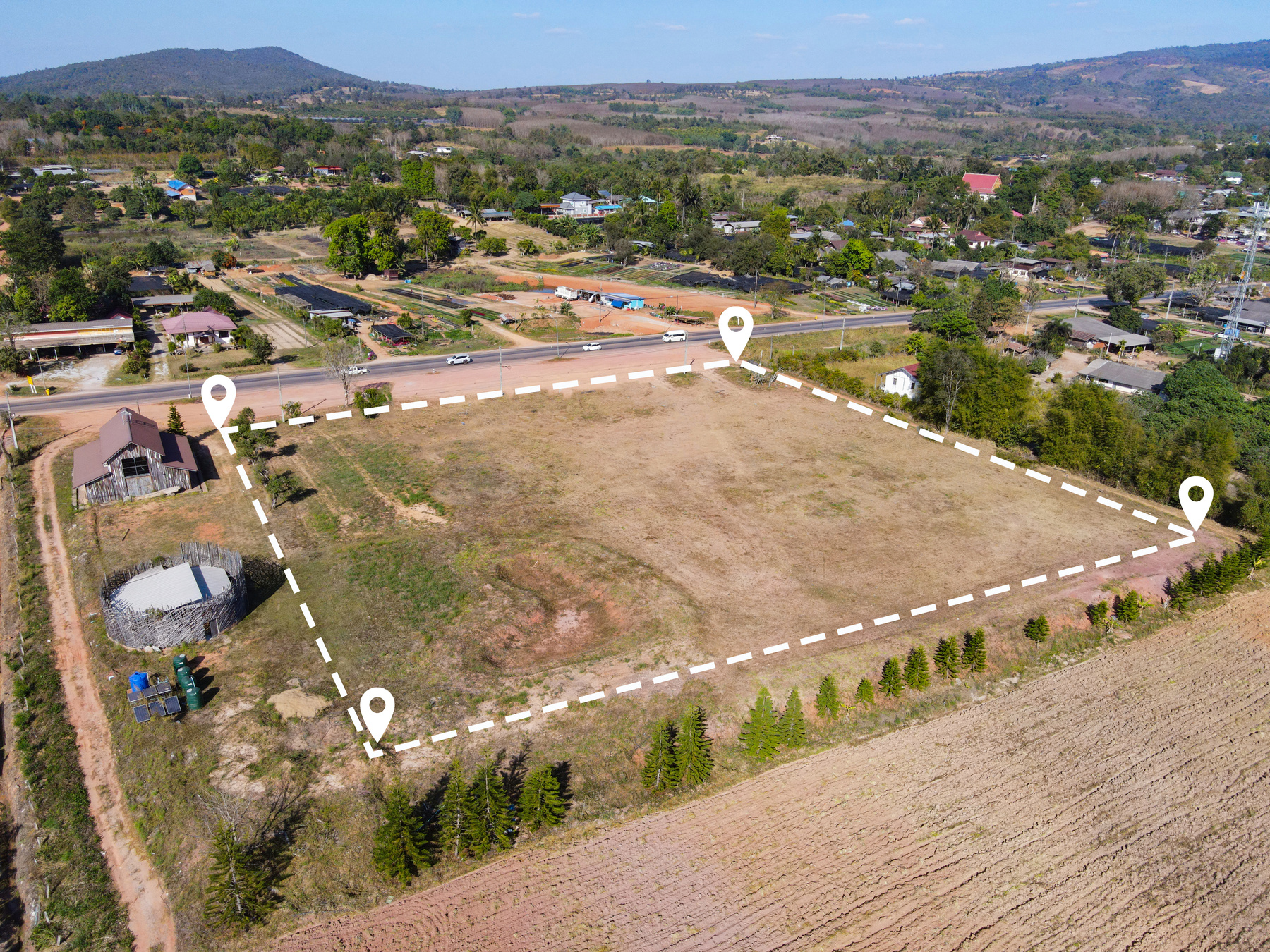 Land plot for building house aerial view, land field with pins,